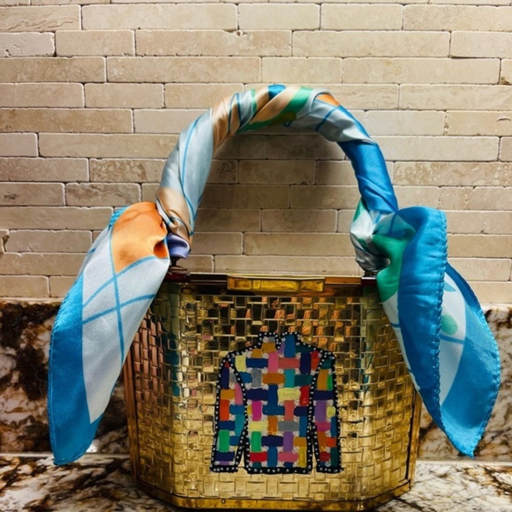Rare majestic lucite purse in gold basketweave with lucite handles and top lid.